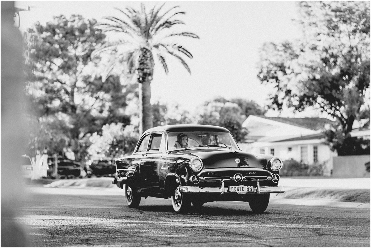 bride riding to ceremony, father of the bride, vintage ford in front of palm trees, scottsdale wedding planner, getaway car