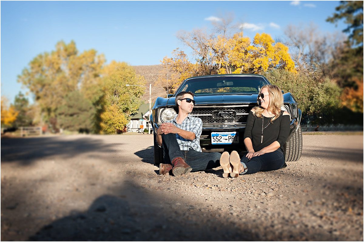 couples portraits in front of muscle car, classic car, vintage mustang,clear creek history park, golden colorado engagement session, autumn, l elizabeth events, colorado engagement photography, mountain engagement photographer