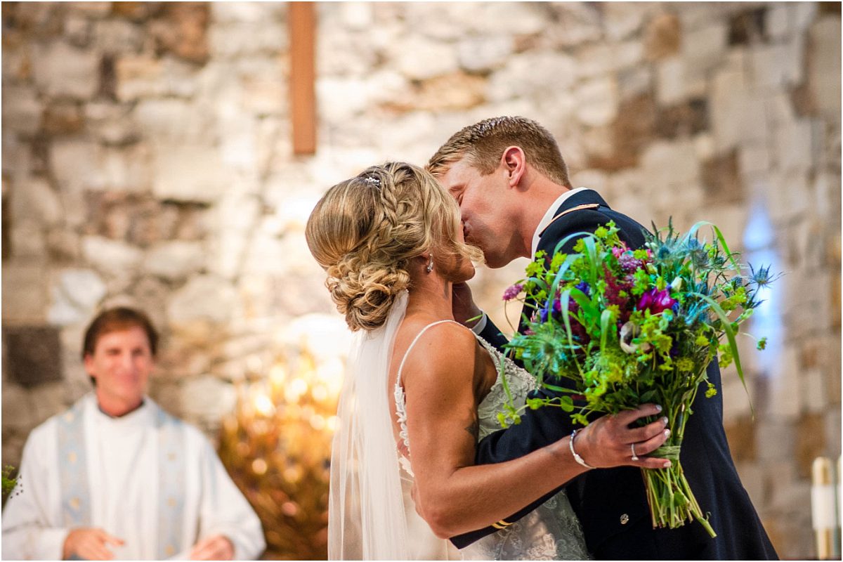 first kiss,church ceremony, steamboat springs, mountain wedding, colorado wedding photographer