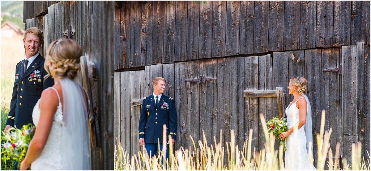 bride and groom portraits, looking at one another, tall grass, old wood barn, steamboat springs, colorado wedding photography, mountain wedding photographer