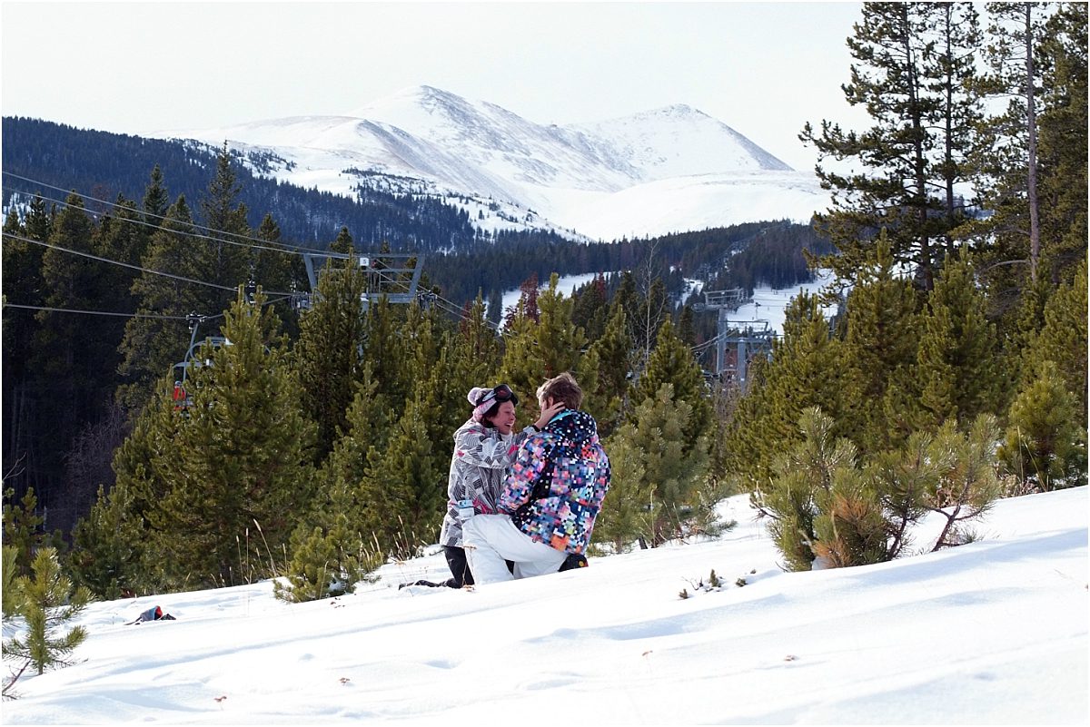 couple in the snow,winter snowboarding proposal, beaver run resort, surprise proposal, colorado photographer, proposal photography, mountain wedding photographer, summit county
