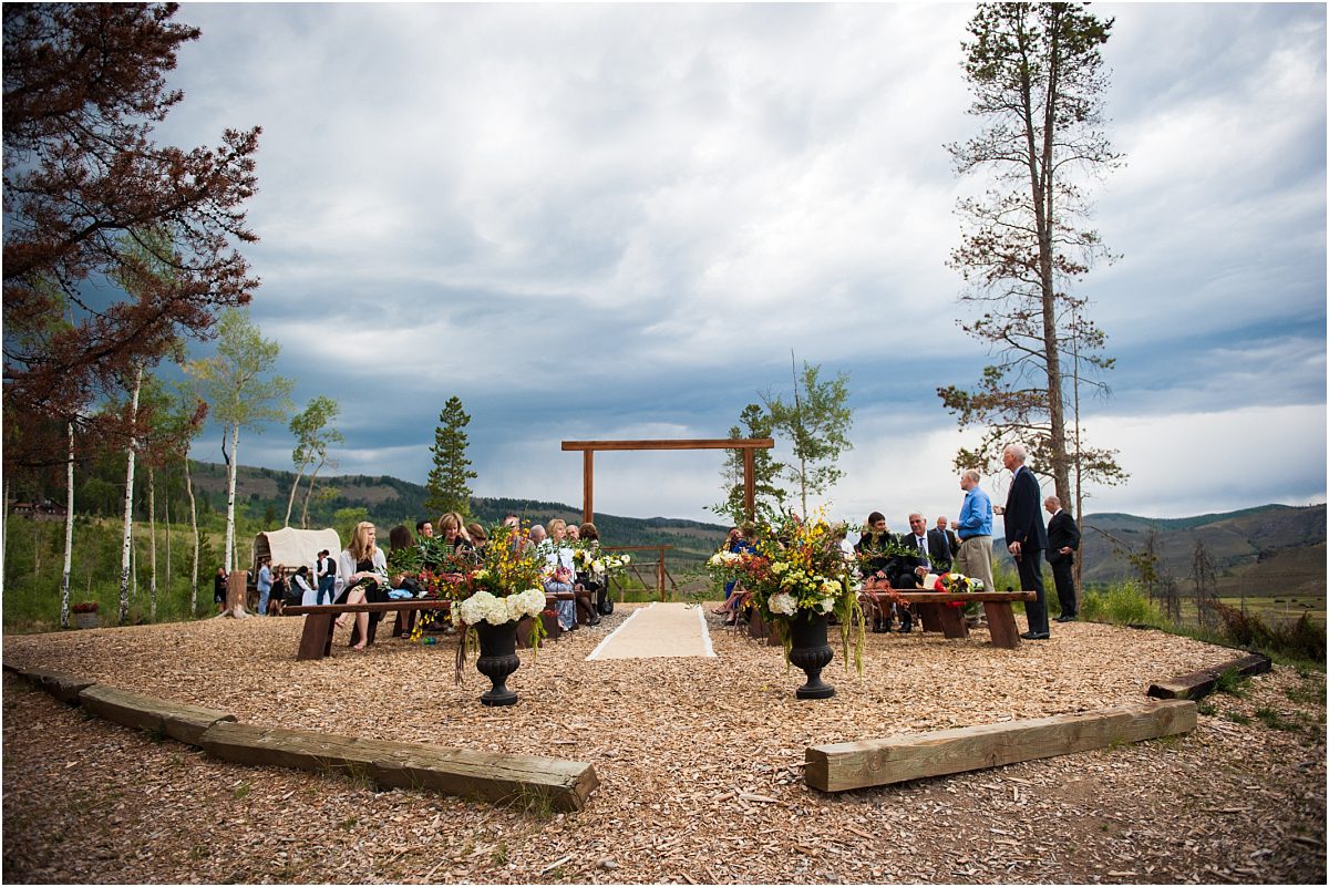 outdoor mountaintop ceremony, bench seating, wooden arch,C Lazy U Ranch, Granby, Colorado, Rustic Ranch Wedding, Colorado Wedding Planner, Mountain Wedding Photographer, woodsie ceremony site
