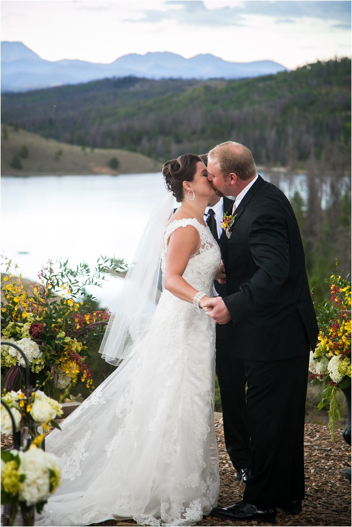 first kiss, bride and groom, ceremony, woodsie outdoor mountain ceremony site,C Lazy U Ranch, Granby, Colorado, Rustic Ranch Wedding, Colorado Wedding Planner, Mountain Wedding Photographer
