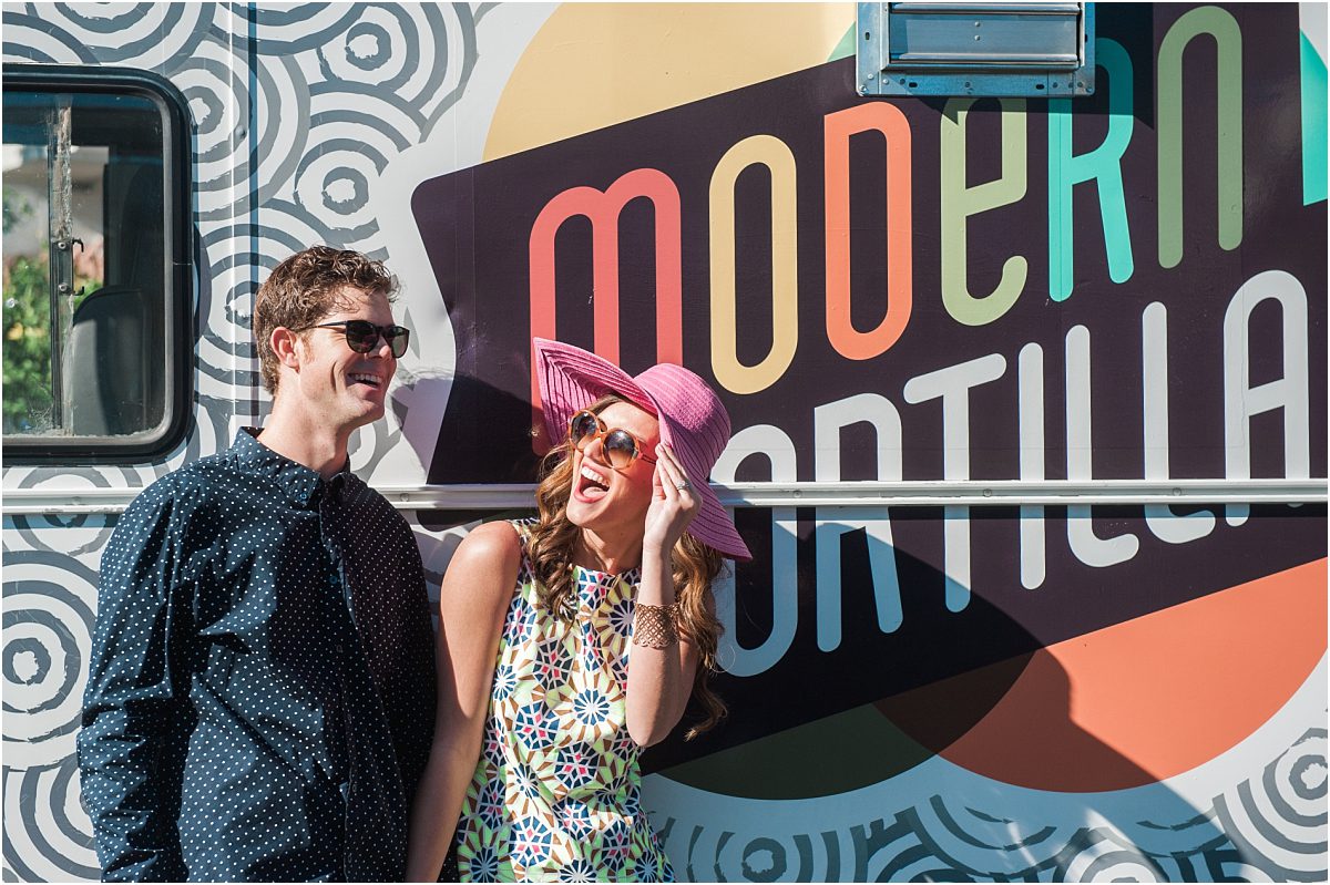 couple laughing in front of modern tortilla food truck, pink floppy hat,hotel valley ho, scottsdale, arizona, styled shoot, engagement session, food trucks, wedding weekend, pool party, phoenix wedding planner, event design