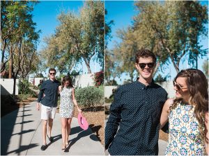 couple walking to pool party, carrying pink floppy hat,hotel valley ho, scottsdale, arizona, styled shoot, engagement session, food trucks, wedding weekend, pool party, phoenix wedding planner, event design