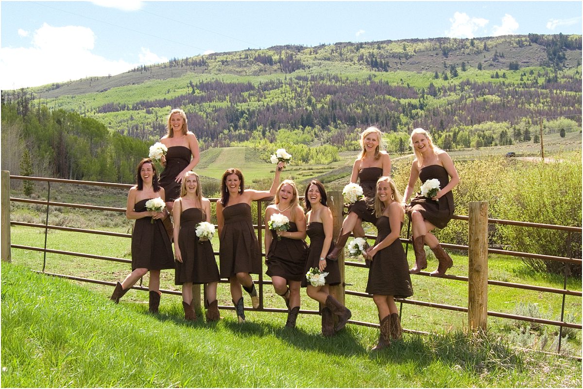 bridesmaids portraits, brown bridesmaids dresses, cowgirl boots, white bouquets, sitting on fence,C Lazy U Ranch Wedding, Colorado Wedding Photography, Mountain Wedding Photographer, Granby