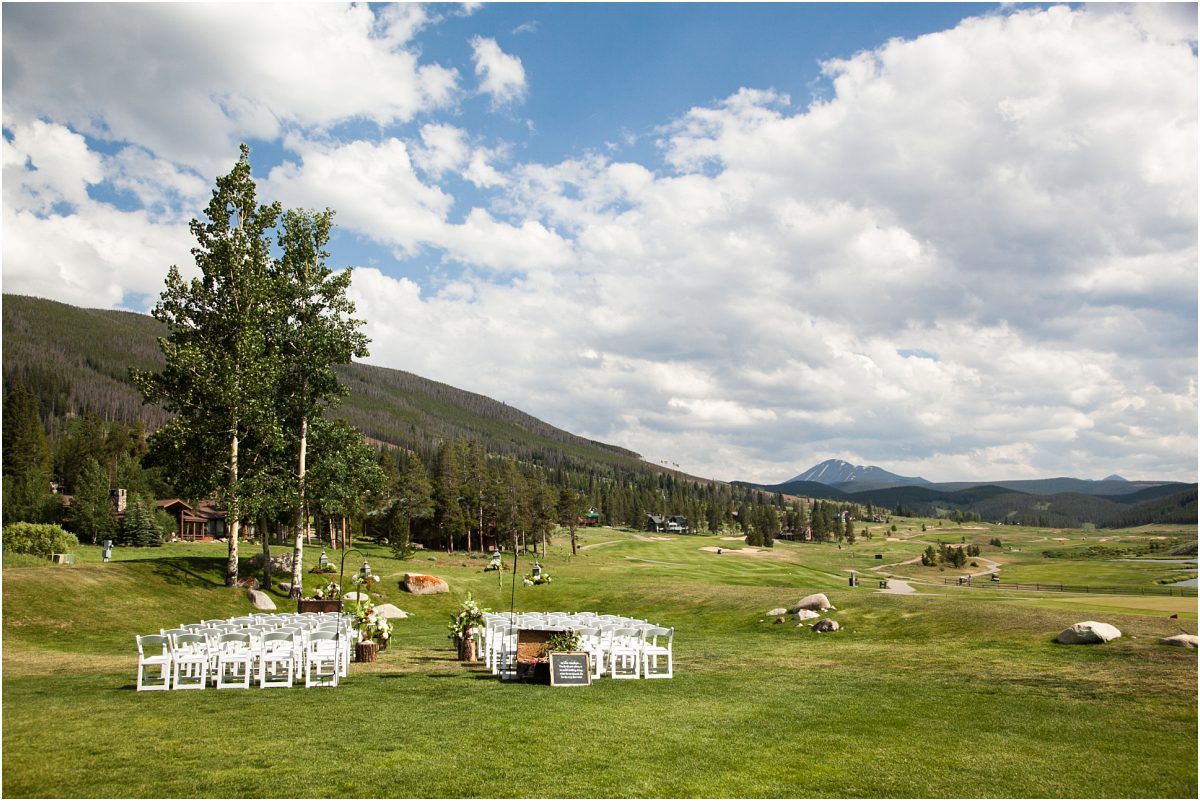 keystone ranch golf course ceremony site, white folding chairs, outdoor colorado wedding ceremony, mountain wedding coordination, destination wedding planning